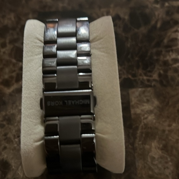 Micheal Kors gray watch with diamond trim